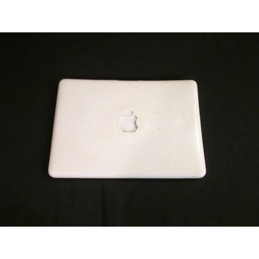 White Macbook With Keyboard Skin